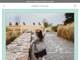 sashaandlucca.com homepage screenshot