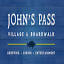 johnspassvillageandboardwalk.com